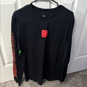 Nike Men's Black Long Sleeve Tee with Red and Green Accents